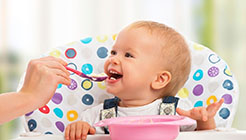 INTRODUCING SOLIDS TO YOUR BABY